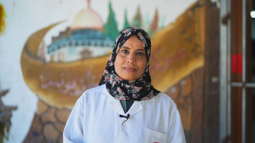 Hanandi from the Palestine Red Crescent Society looks intently at the camera after responding to the crisis in Gaza.